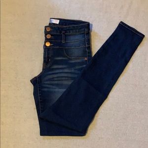Women’s dark blue mid-rise jeans
